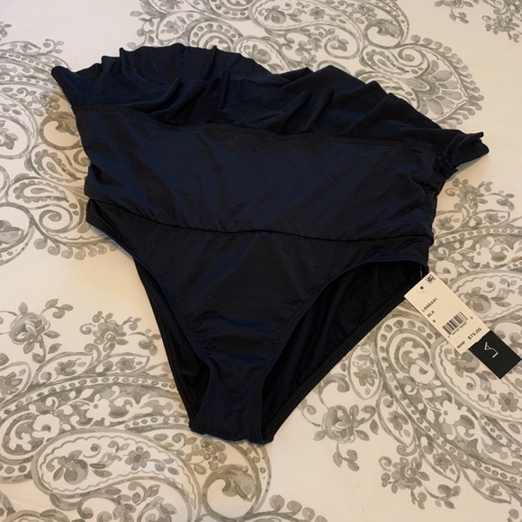 Never worn, tags in swim skirt bottom. - Picture 3 of 6